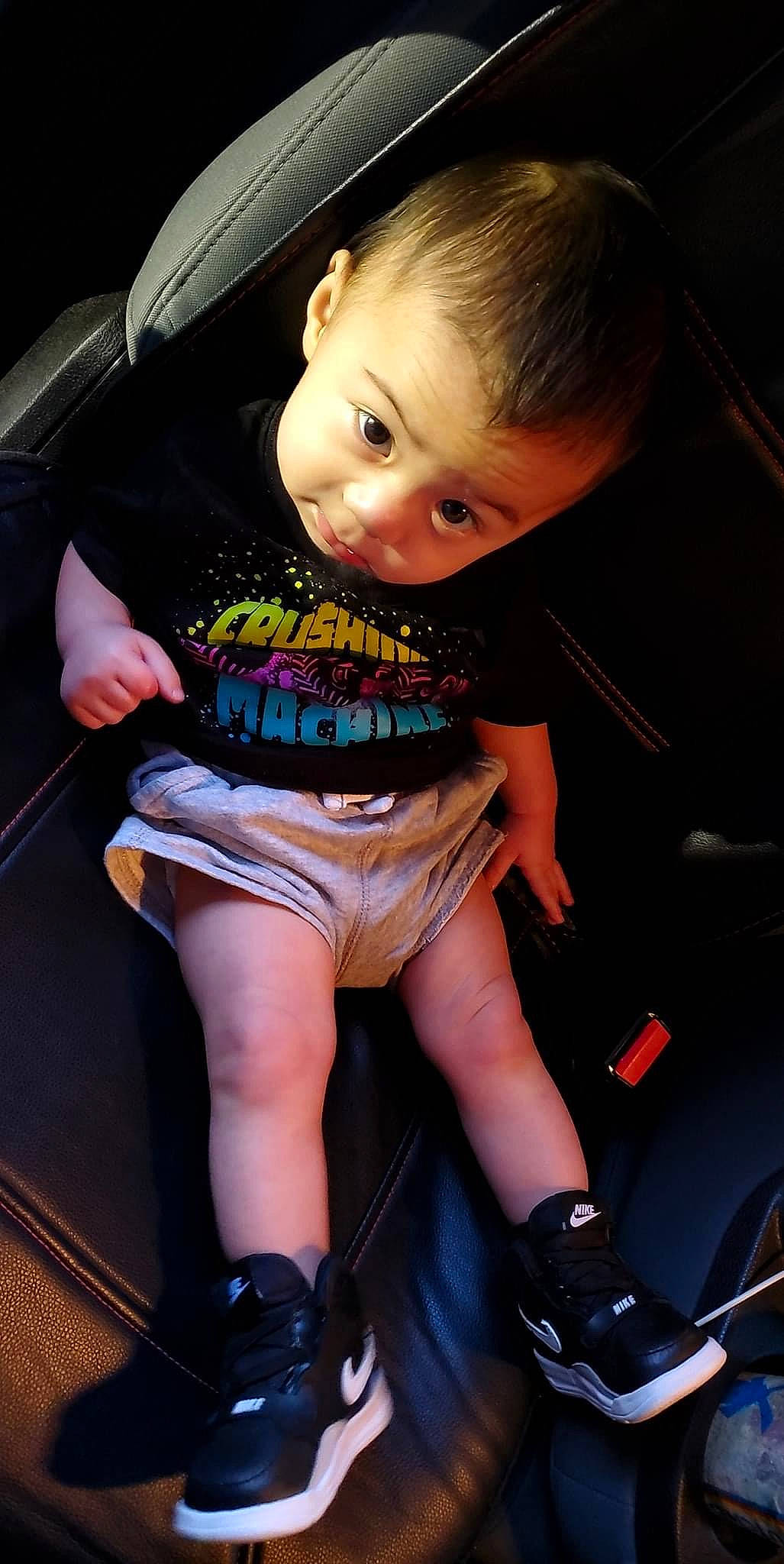 Kaiser is registered to the contest to win money with this photo: arm, baby_toddler_clothing, bumper, chair, cool, finger, flash_photography, fun, hairstyle, hand, joint, knee, lap, leg, mouth, organ, person, skin, sneakers, thigh