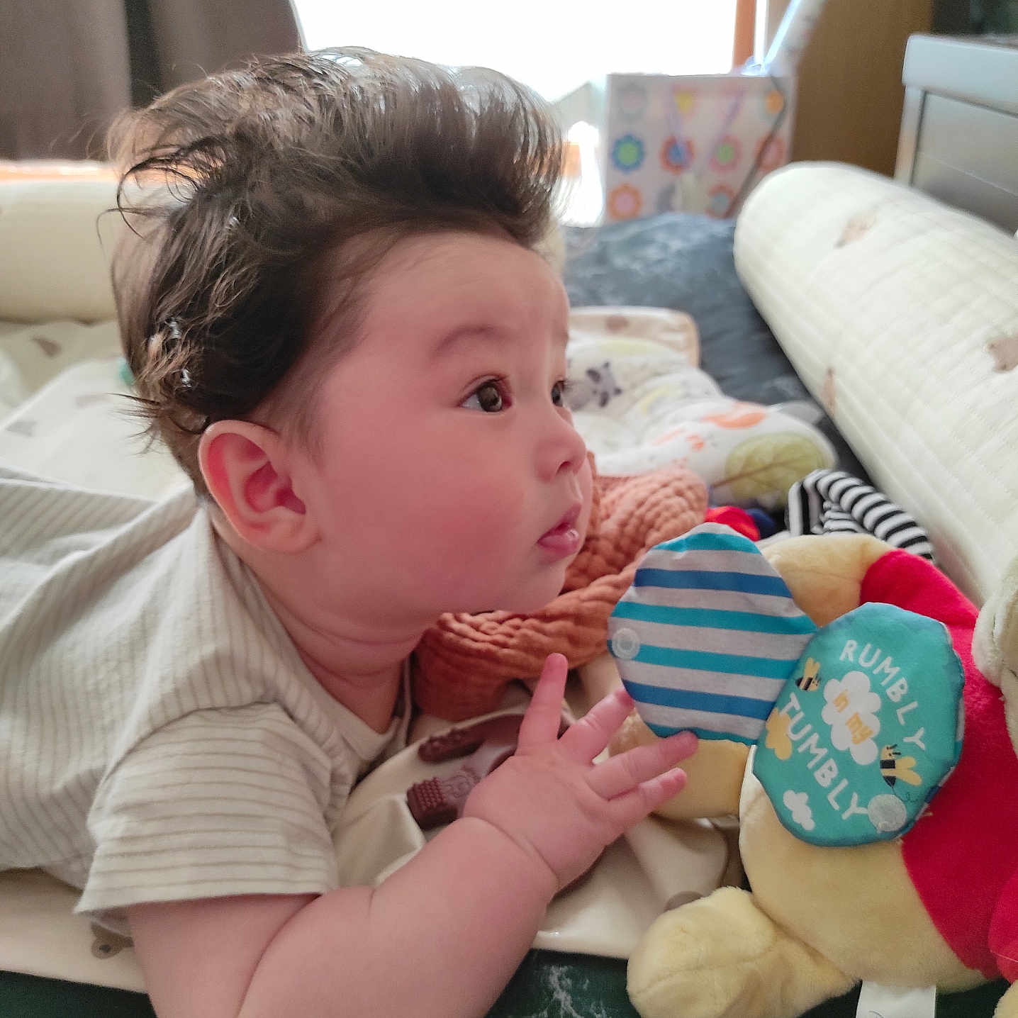 Thorzen is registered to the contest to win money with this photo: architecture, baby, bodypart, building, couch, cushion, face, finger, furniture, hand, head, homedecor, indoors, livingroom, person, photography, plush, portrait, room, toy
