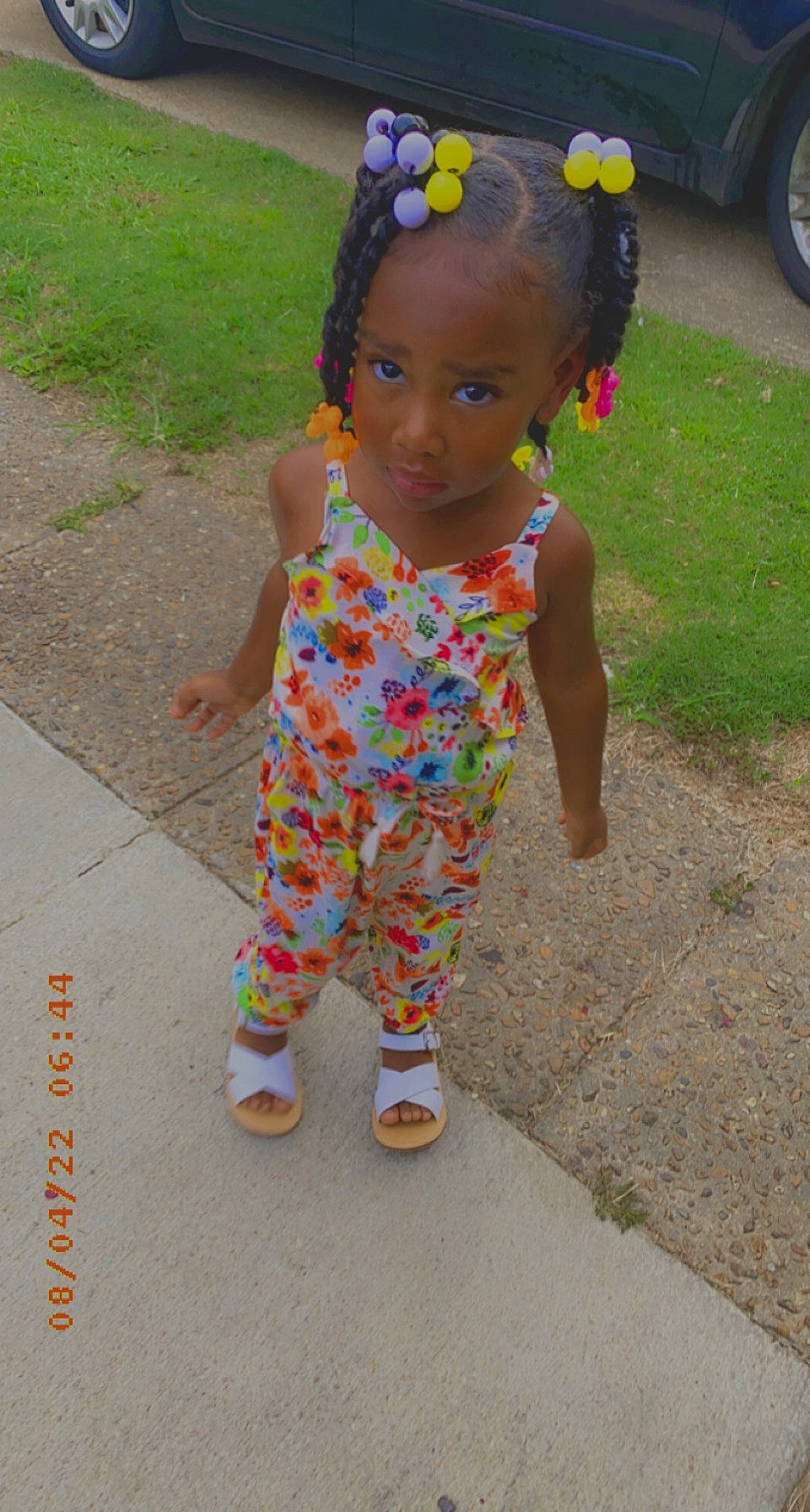 Ariana joined the competition — help win amazing prizes! automotive_tire, baby, baby_toddler_clothing, child, fun, grass, hair_tie, happy, headband, pattern, person, pink, sleeve, tire, toddler, toy, wheel, yellow