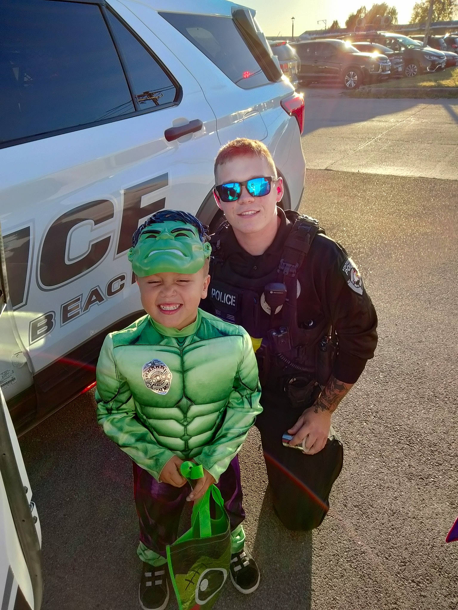 Mauricio is registered to the contest to win money with this photo: asphalt, automotive_design, automotive_exterior, automotive_lighting, automotive_tire, bumper, car, cool, eyewear, glasses, goggles, grass, headgear, headwear, joy, motor_vehicle, person, public_space, smile, sunglasses