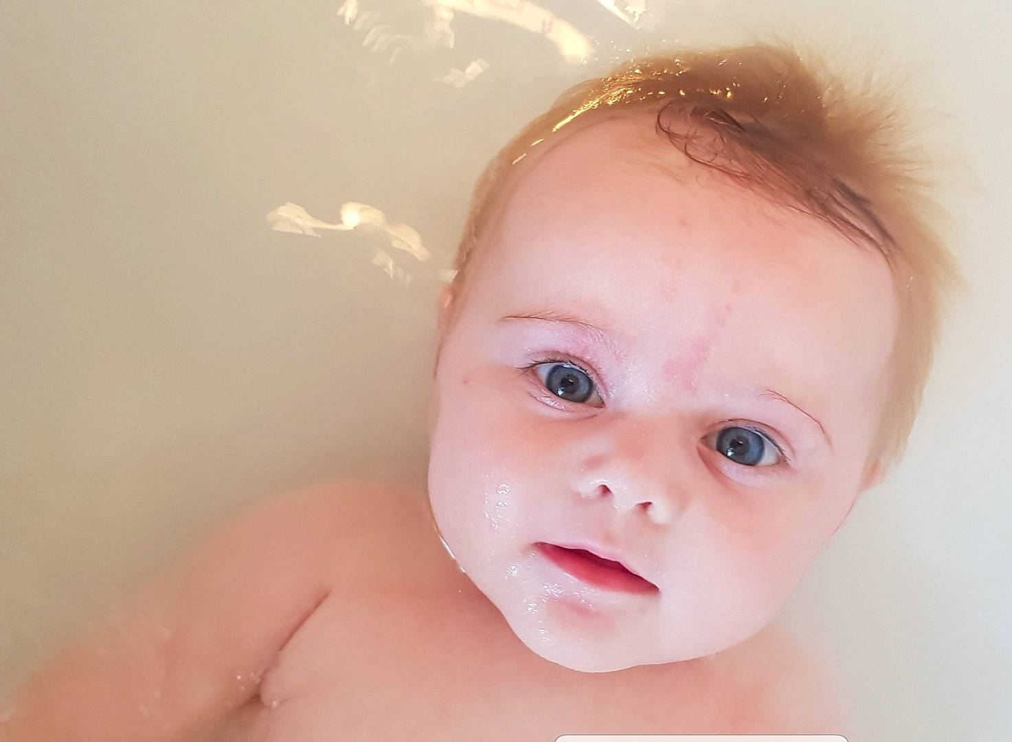 Maeve is registered to the contest to win money with this photo: baby, baby_bathing, baby_toddler_clothing, bathing, cheek, chest, child, ear, eyelash, flash_photography, fun, gesture, happy, lip, no_expression, nose, person, portrait_photography, stomach, thumb