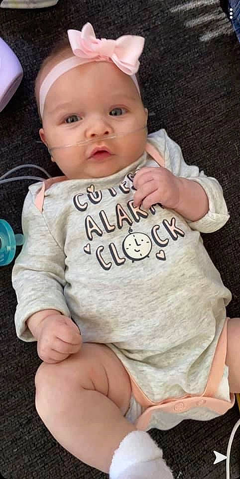 Laikyn is registered to the contest to win money with this photo: baby, baby_products, baby_toddler_clothing, cheek, child, headgear, headwear, person, pink, product, sitting, skin, sleeve, smile, toddler