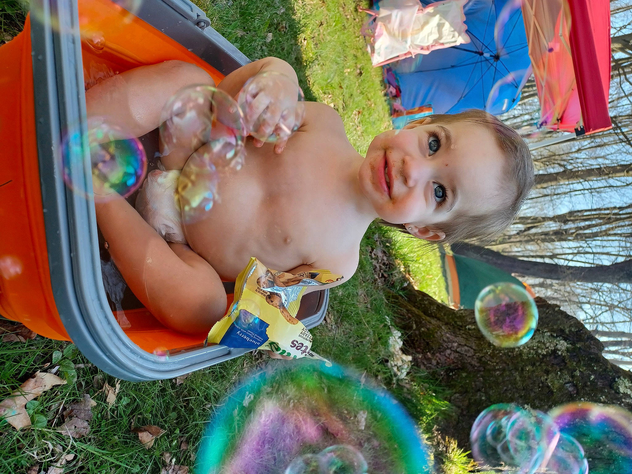 Emry is registered to the contest to win money with this photo: baby, baby_products, baby_toddler_clothing, blue, chest, child, event, facial_expression, fun, grass, green, happy, joy, leisure, people_in_nature, person, plant, recreation, smile, summer