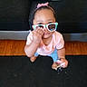 A'Myah joined the competition — help win amazing prizes! accessories, blue_jeans, brown_shoes, carpet, child, couch, cute, floor, gesture, hand, indoor, jacket, keys, person, pink_headband, pink_shirt, standing, sunglasses, toddler, toy