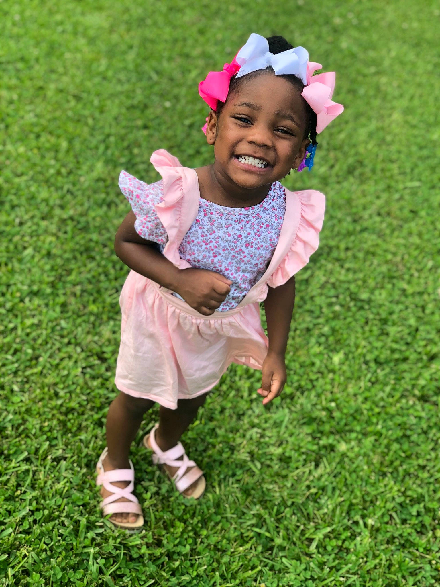 Kynslee joined the competition — help win amazing prizes! baby, child, facial_expression, finger, fun, grass, grass_family, green, happy, joy, lawn, meadow, people, people_in_nature, person, photography, pink, plant, play, smile