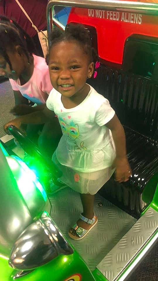 Kynslee is registered to the contest to win money with this photo: child, green, person, play, smile, toddler