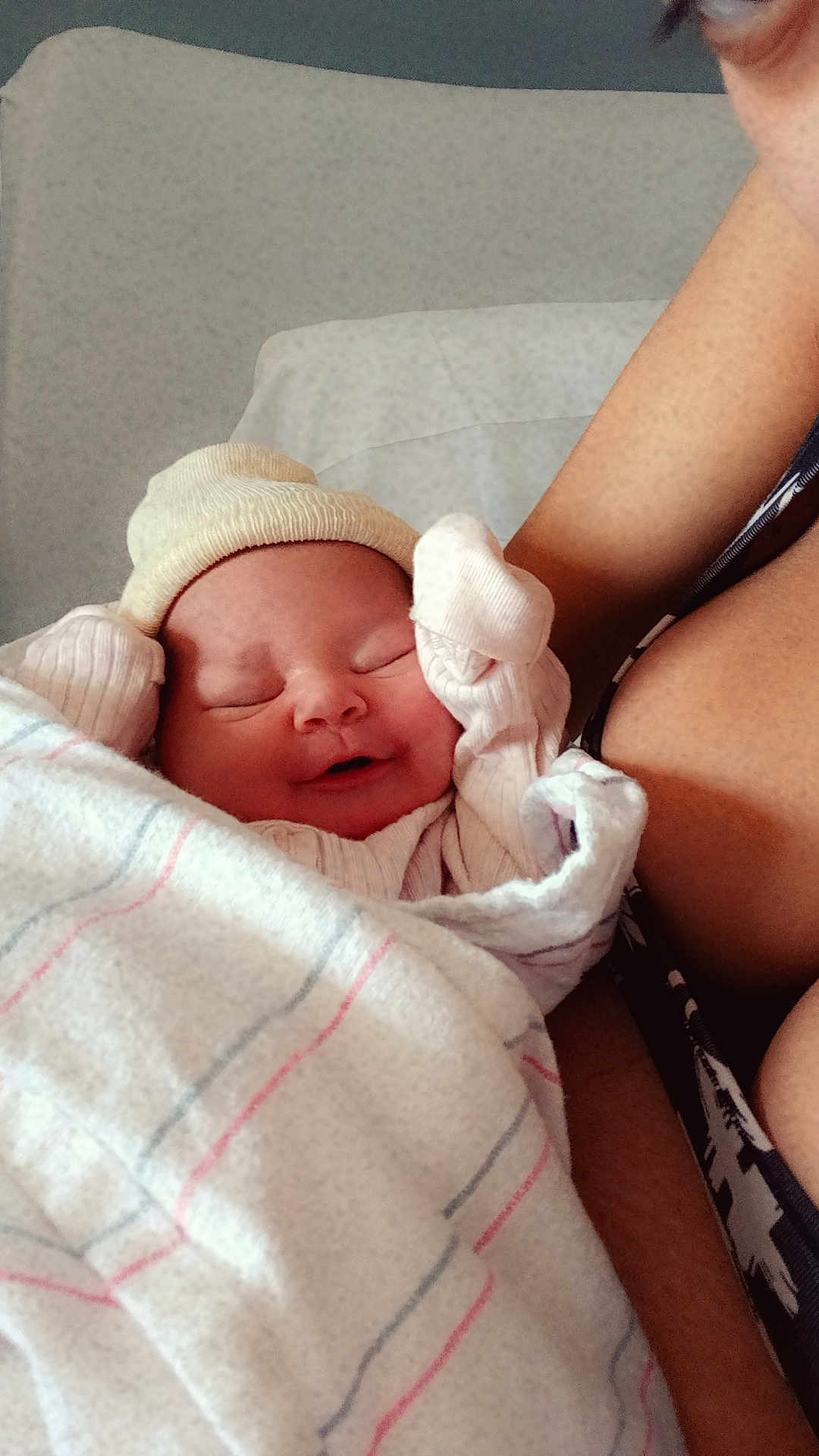Khaleesi joined the competition — help win amazing prizes! newborn, baby, blanket, hat, mittens, sleeping, smiling, person, arm, skin, cozy, indoor, resting, infant, comfort, tenderness, closeup, human, wrapped, care