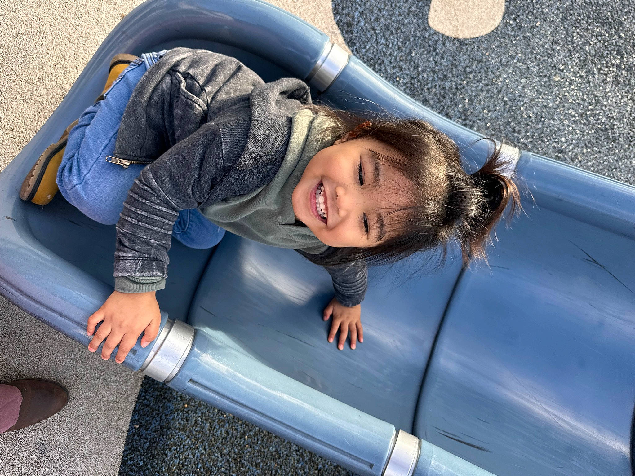 Levi is registered to the contest to win money with this photo: auto_part, automotive_design, automotive_exterior, automotive_tire, automotive_wheel_system, bumper, comfort, electric_blue, family_car, flash_photography, fun, grass, hood, joy, leisure, motor_vehicle, person, recreation, smile, toddler