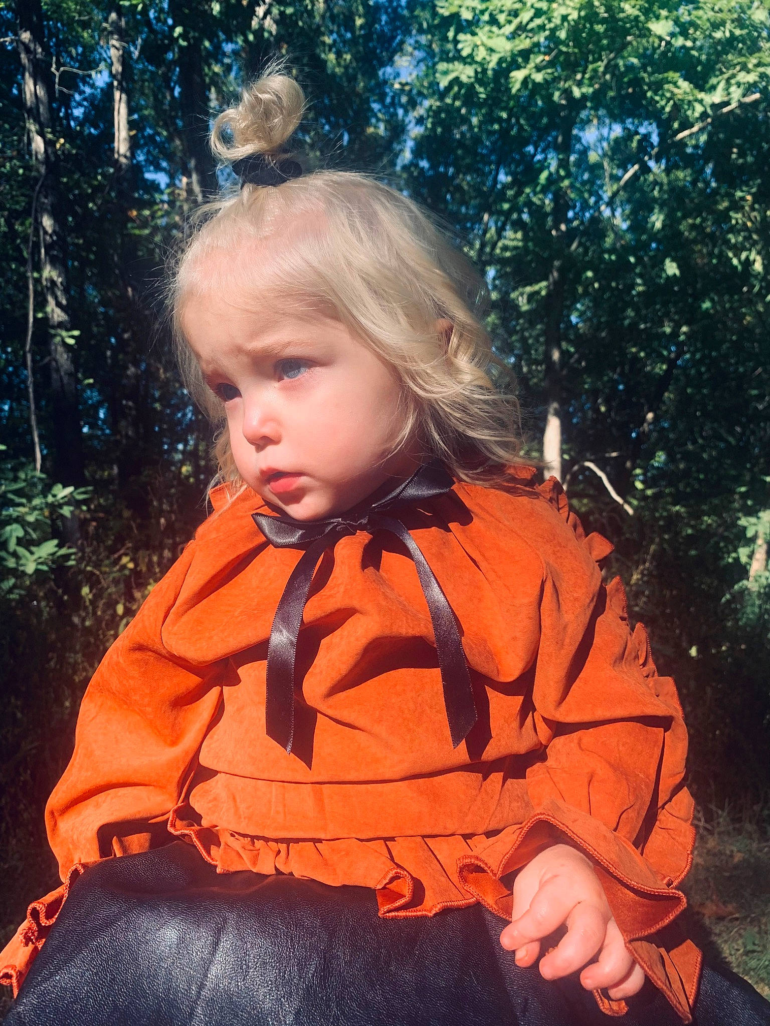 Adalyn joined the competition — help win amazing prizes! baby_toddler_clothing, blond, brown_hair, child, fun, garden, grass, hair, happy, iris, jacket, orange, people_in_nature, person, plant, pumpkin, sitting, sleeve, tints_and_shades, toddler