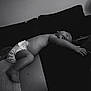 baby, sleeping, diaper, person, torso, black_and_white, couch, intimate, peaceful, infant, skin, rest, relaxation, indoor, monochrome, human, child, calm, quiet, tender