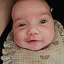 Hailey participe au concours pour gagner de l'argent avec cette photo : baby, infant, face, close_up, bib, clothing, cute, child, skin, expression, eyes, head, soft_texture, pattern, warm, comfort, portrait, young, adorable, resting