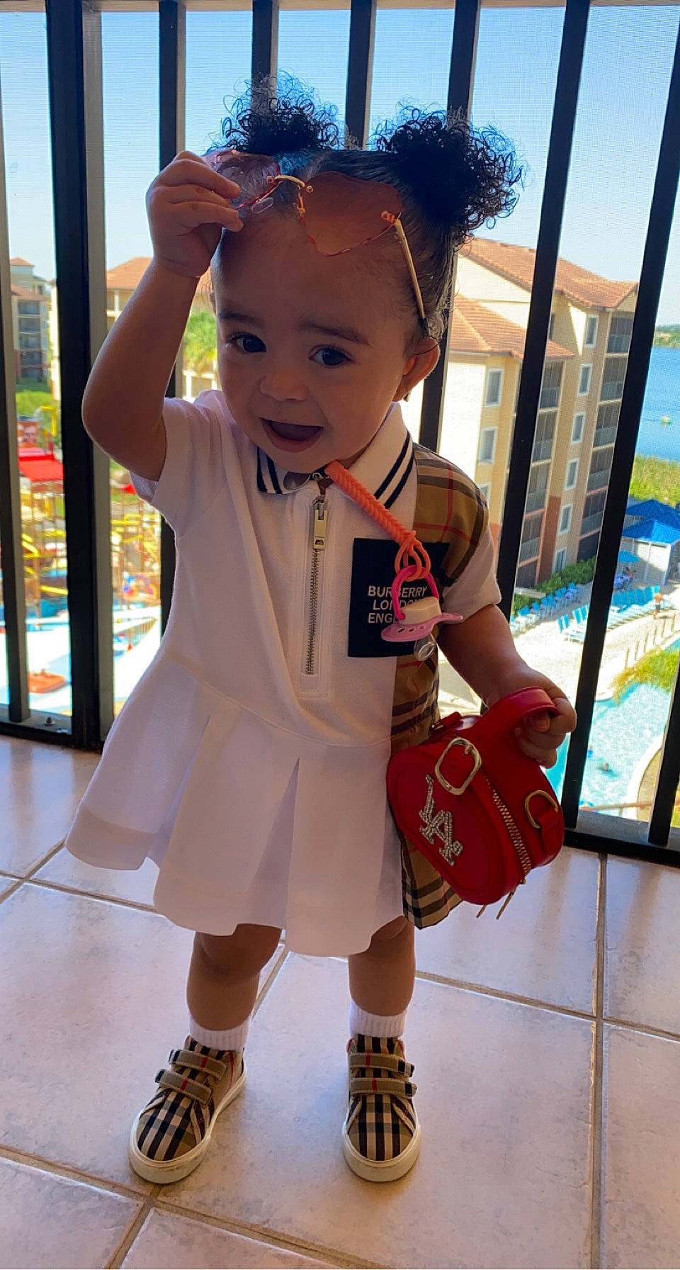 Mylani joined the competition — help win amazing prizes! baby, baby_toddler_clothing, child, event, finger, flooring, fun, hairstyle, hand, happy, human_leg, joint, leisure, person, skin, sky, smile, snapshot, standing, toddler