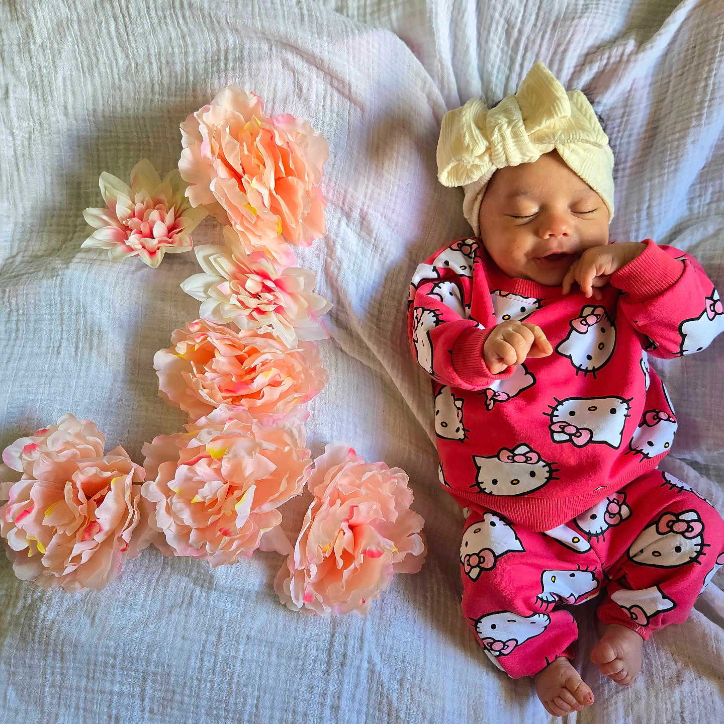 Gireh joined the competition — help win amazing prizes! baby, blanket, bow, child, cozy, cute, flowers, happy, headband, hello_kitty, indoors, infant, newborn, peach_flowers, pink_clothing, portrait, resting, sleeping, smiling, soft_texture