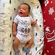 Nathan joined the competition — help win amazing prizes! baby, infant, onesie, socks, smiling, face, cushion, sea_creatures, sharks, seahorses, jellyfish, whales, blanket, bed, christmas, holiday, red, white, person, happy