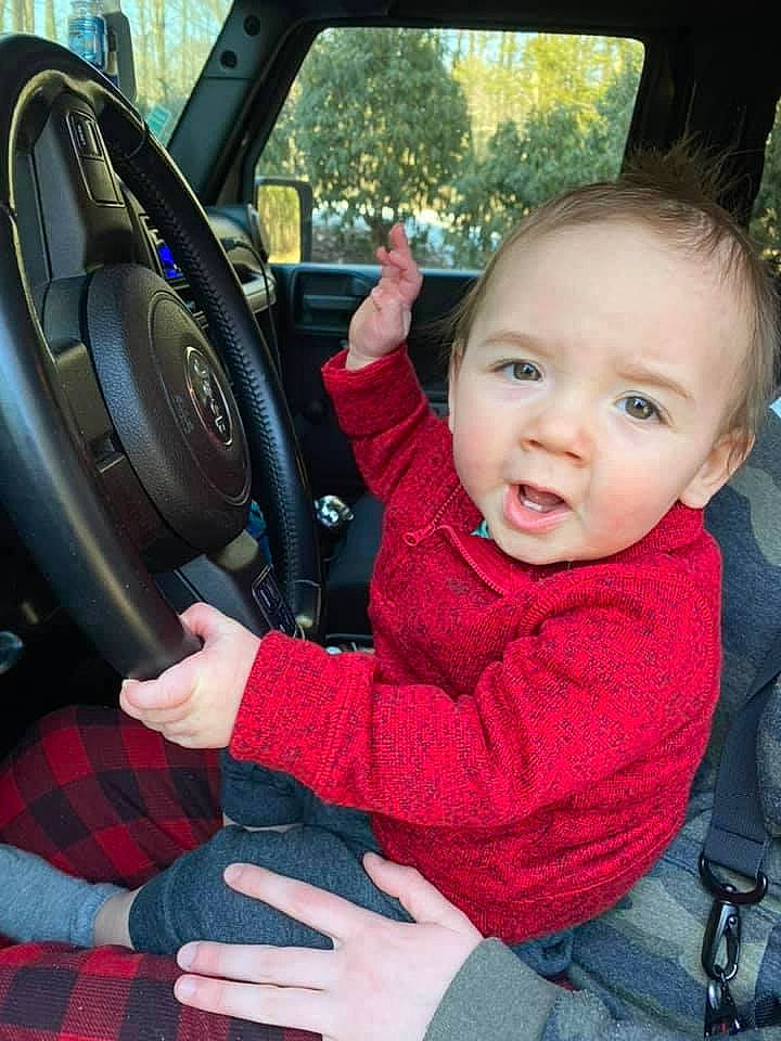 Lincoln joined the competition — help win amazing prizes! automotive_mirror, baby_toddler_clothing, car, car_seat, car_seat_cover, comfort, finger, gesture, motor_vehicle, person, plant, product, seat_belt, steering_part, steering_wheel, toddler, tree, vehicle, vehicle_door, wheel