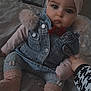 baby, infant, child, headwrap, bow, denim_jacket, fur_trim, pom_pom, leggings, socks, bed, blanket, hand, adult_hand, portrait, cute, big_eyes, indoor, fashion, pink