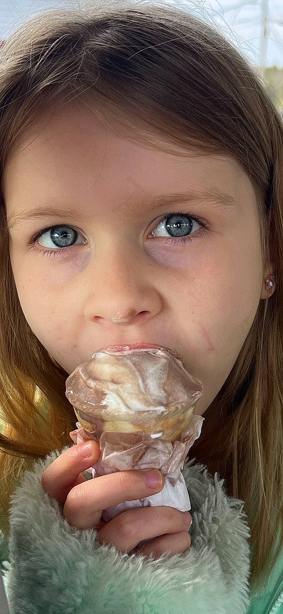 Eliza is registered to the contest to win money with this photo: beauty, cheek, drink, drinking, drinkware, eyelash, fluid, glass, hand, happy, jaw, lip, liquid, long_hair, mouth, neck, nose, person, skin, toddler