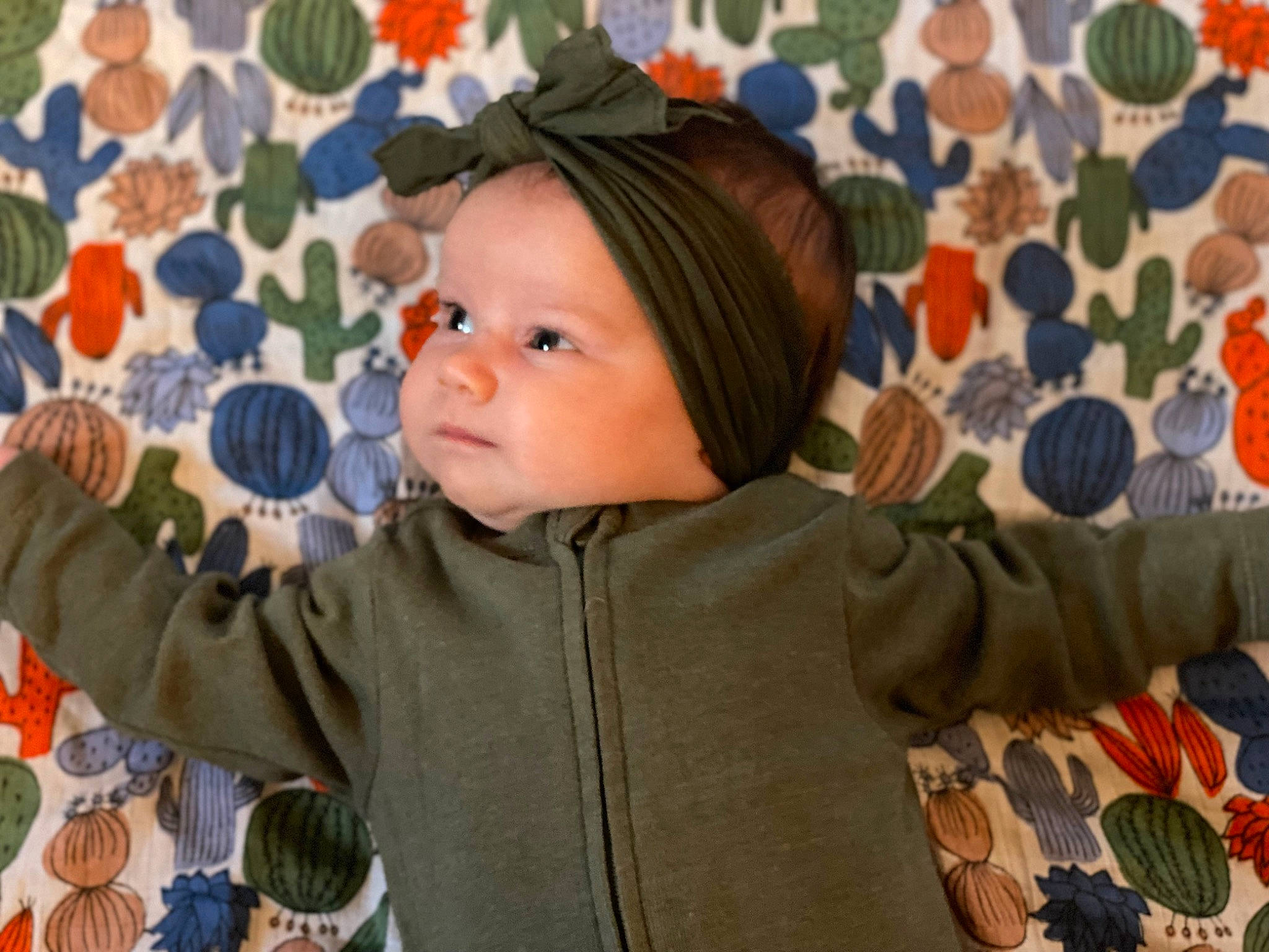 Zoey joined the competition — help win amazing prizes! art, baby, baby_toddler_clothing, cap, cheek, child, eye, face, fun, happy, headwear, leaf, linens, orange, outerwear, pattern, people, person, skin, sleeve