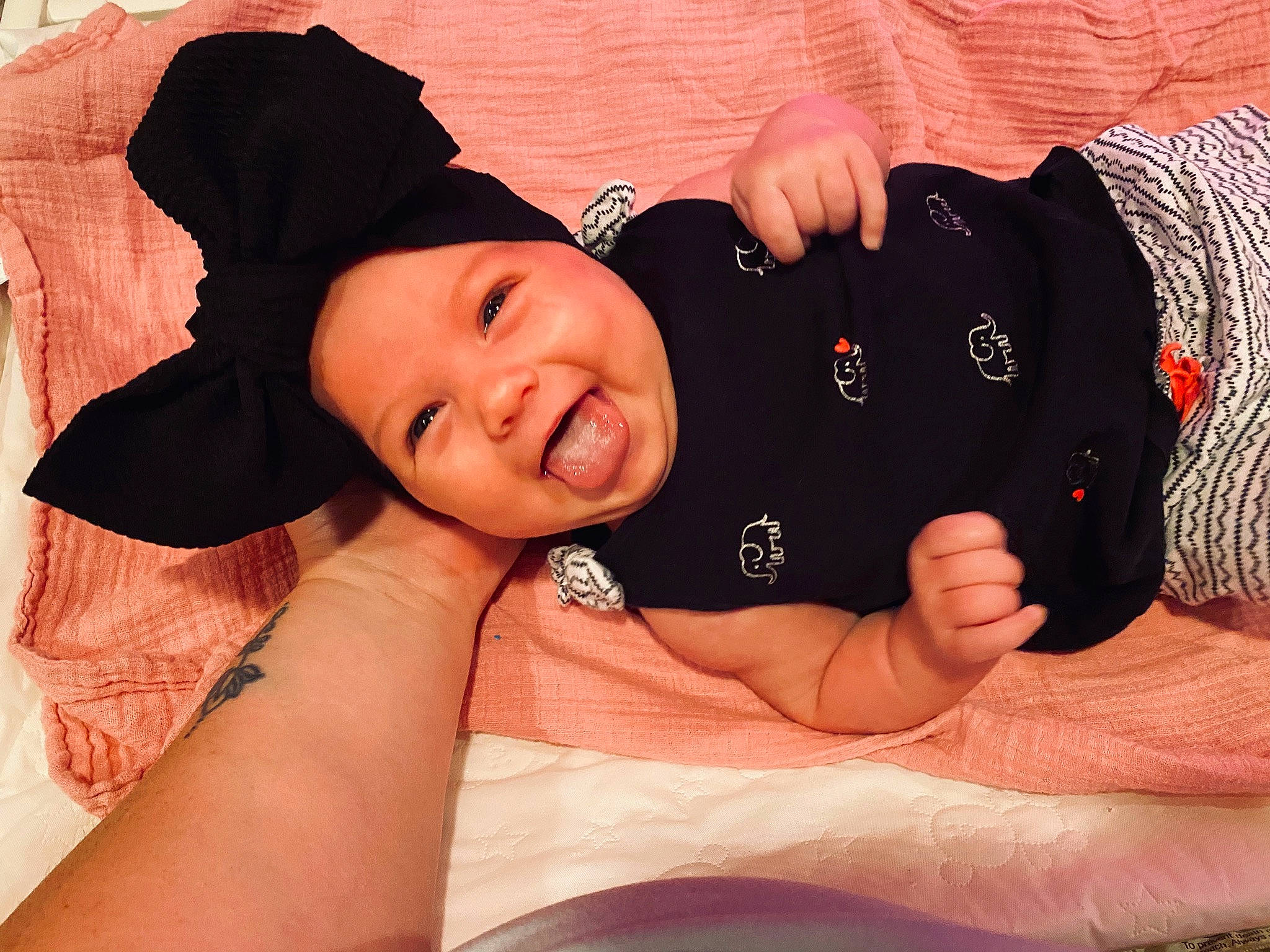 Ruby joined the competition — help win amazing prizes! baby, beanie, beauty, black_hair, cap, cheek, child, ear, finger, fun, gesture, hand, happy, head, headgear, headwear, person, photography, pink, skin