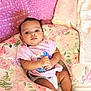 Alivia joined the competition — help win amazing prizes! baby, blanket, child, comfort, cushion, cute, diaper, face, floral_pattern, foot, hand, home, indoors, infant, looking_at_camera, pink_clothing, portrait, relaxed, resting, soft_fabric