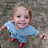 toddler, child, smiling, portrait, outdoor, grass, leaves, autumn, red_shoes, sandals, gray_shirt, blonde_hair, blue_eyes, face, teeth, standing, playful, happy, close_up, photography