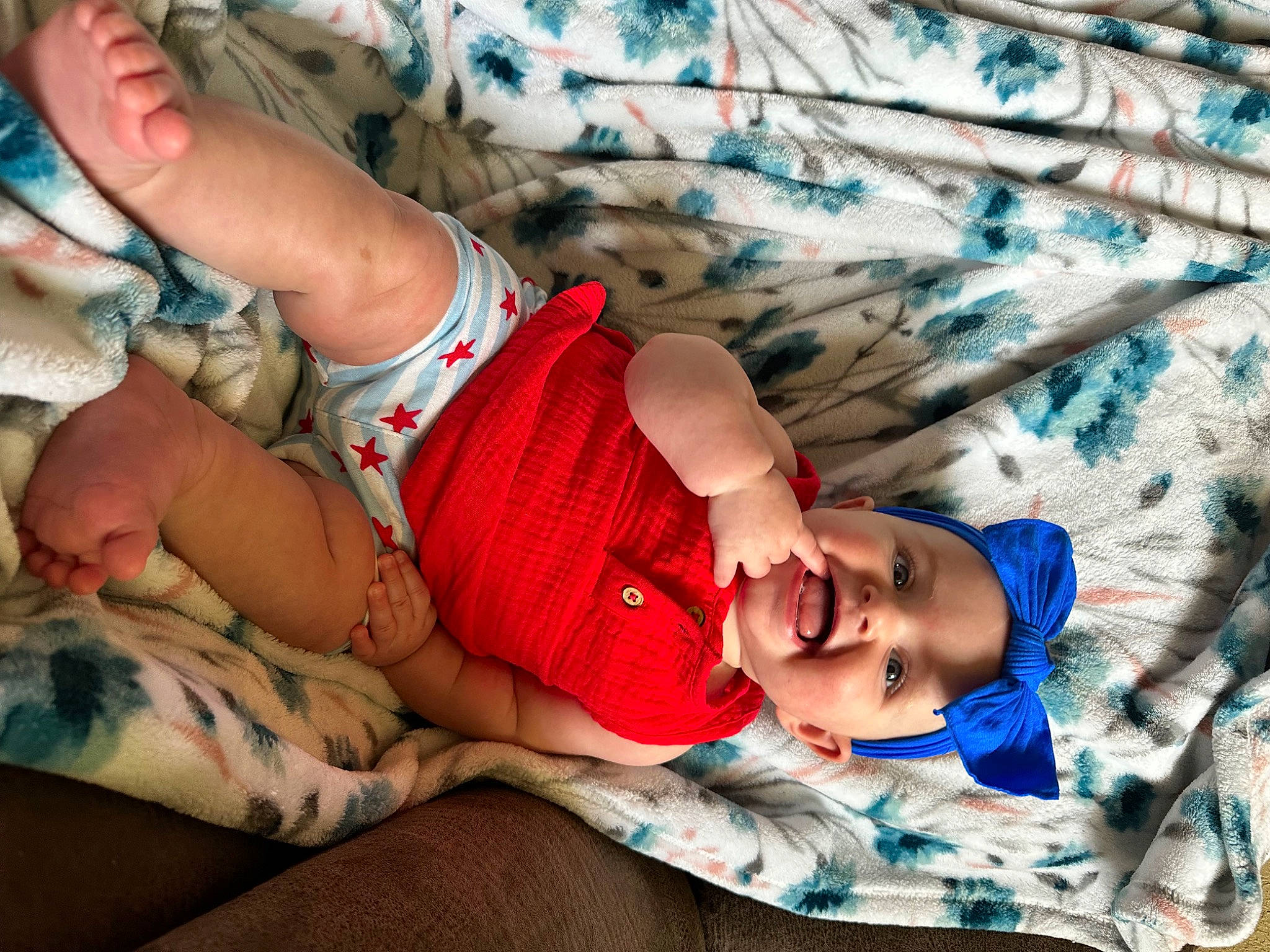 Averie joined the competition — help win amazing prizes! abdomen, baby_toddler_clothing, comfort, cool, couch, elbow, glasses, happy, headwear, human_body, interaction, joint, knee, lap, leg, mouth, pattern, person, shorts, thigh