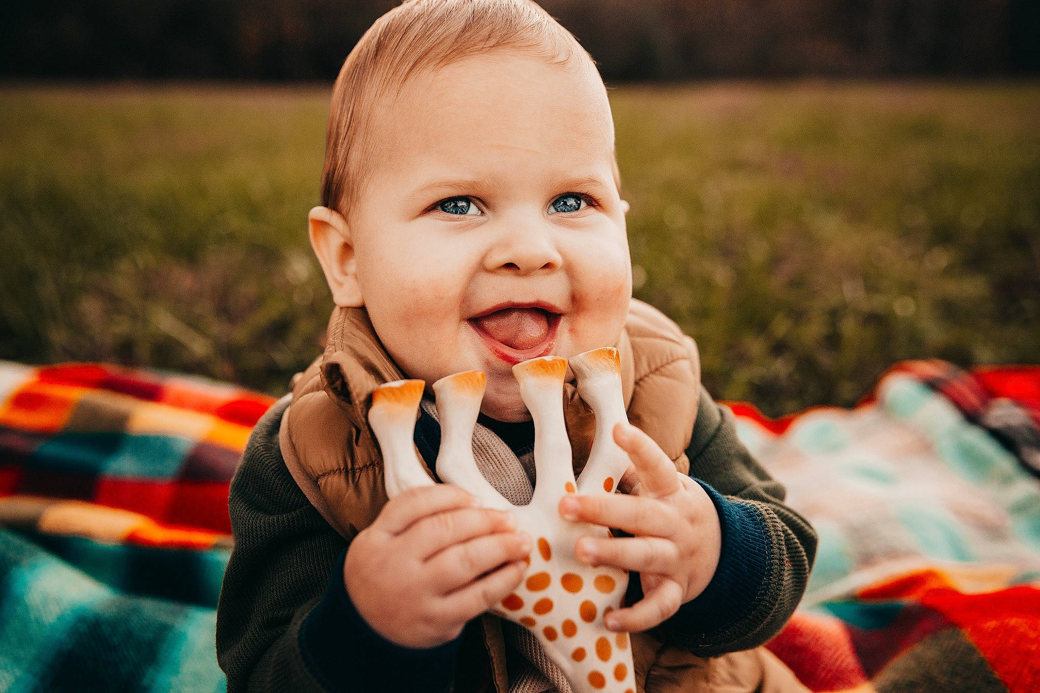 Alaric joined the competition — help win amazing prizes! baby, baby_toddler_clothing, child, eye, flash_photography, fun, gesture, grass, happy, iris, orange, people, people_in_nature, person, photograph, plant, skin, smile, sunlight, toddler
