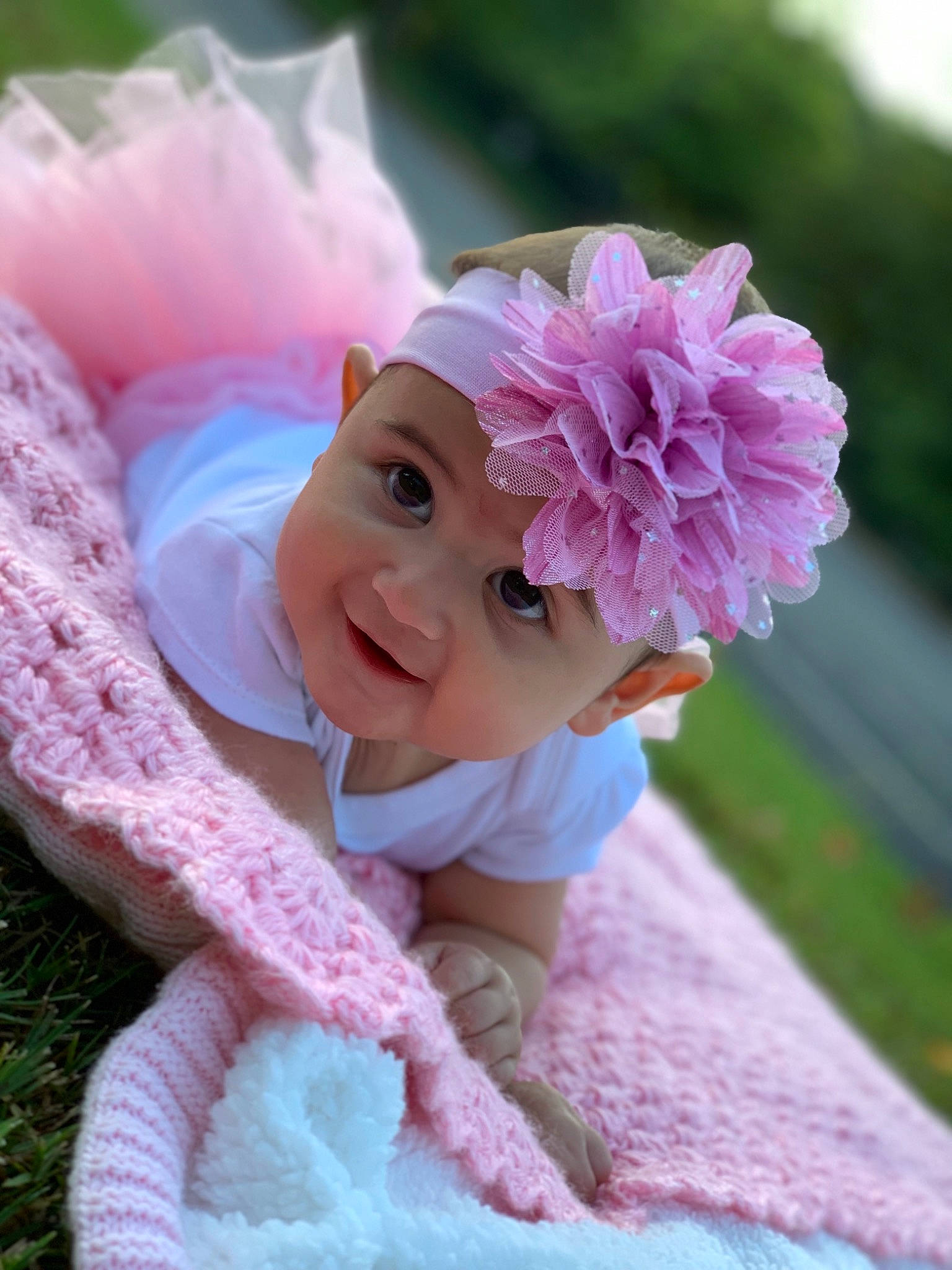 Kathryn is registered to the contest to win money with this photo: baby, baby_products, baby_toddler_clothing, beanie, bonnet, cap, child, costume_accessory, crochet, fashion_accessory, flower, hair_accessory, hat, headgear, headpiece, headwear, person, petal, pink, plant