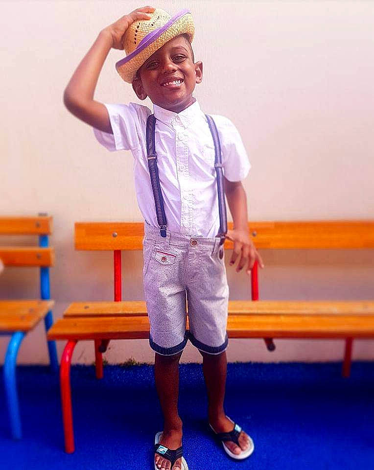 Aaron participe au concours pour gagner de l'argent avec cette photo : arm, boy, cap, child, clothing, cool, fashion_accessory, fun, headgear, headwear, jeans, joint, joy, leisure, outerwear, person, shoe, shorts, shoulder, sleeve