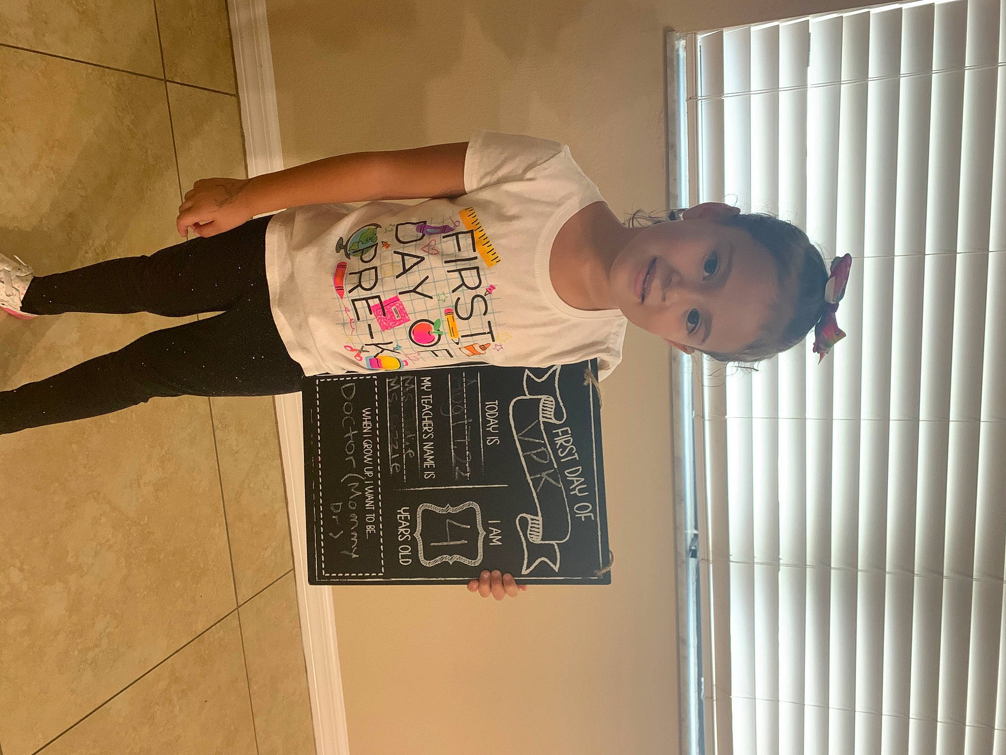 Micaela joined the competition — help win amazing prizes! arm, elbow, fashion_design, flooring, font, hardwood, human_leg, joy, knee, pattern, person, room, sleeve, textile, thigh, waist, walking_shoe, wood, wrist