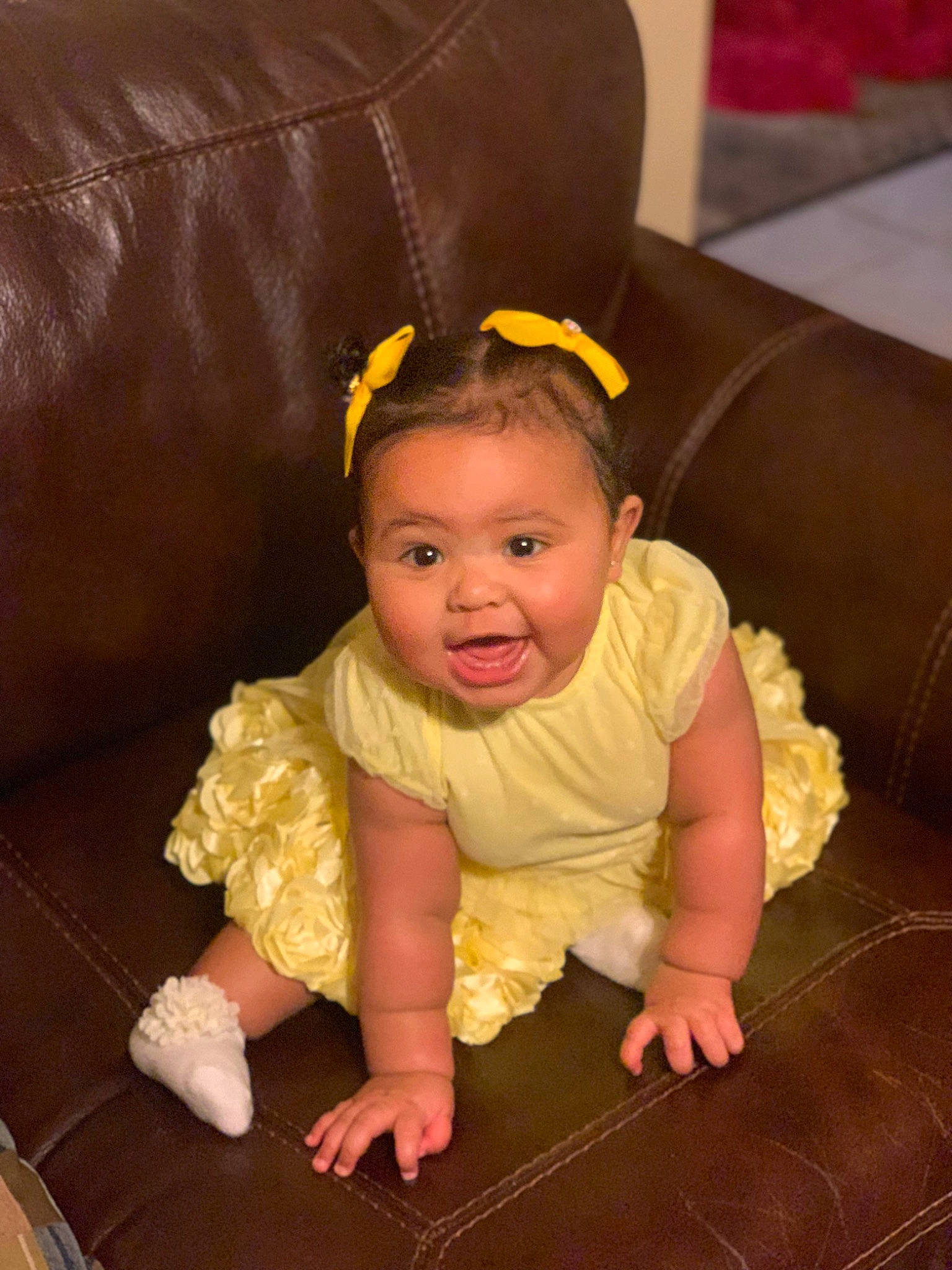 Leilani joined the competition — help win amazing prizes! baby, baby_toddler_clothing, cheek, child, comfort, costume_hat, couch, eye, face, fashion_accessory, flooring, fun, happy, head, headband, iris, person, sitting, sleeve, smile