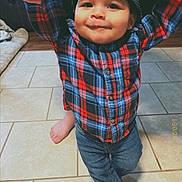 Colsen is registered to the contest to win money with this photo: baby, backwards_cap, boy, cap, celebration, child, cute, footwear, hand_holding, happy, home, indoor, jeans, person, plaid_shirt, smiling, support, tile_floor, toddler, walking