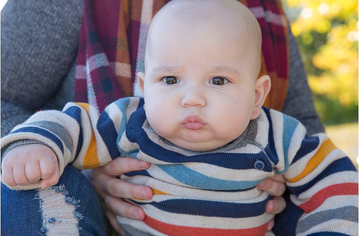 Ismael is registered to the contest to win money with this photo: baby, beauty, cheek, child, chin, close_up, eye, face, finger, grass, hand, head, iris, lip, mouth, nose, people, person, skin, smile