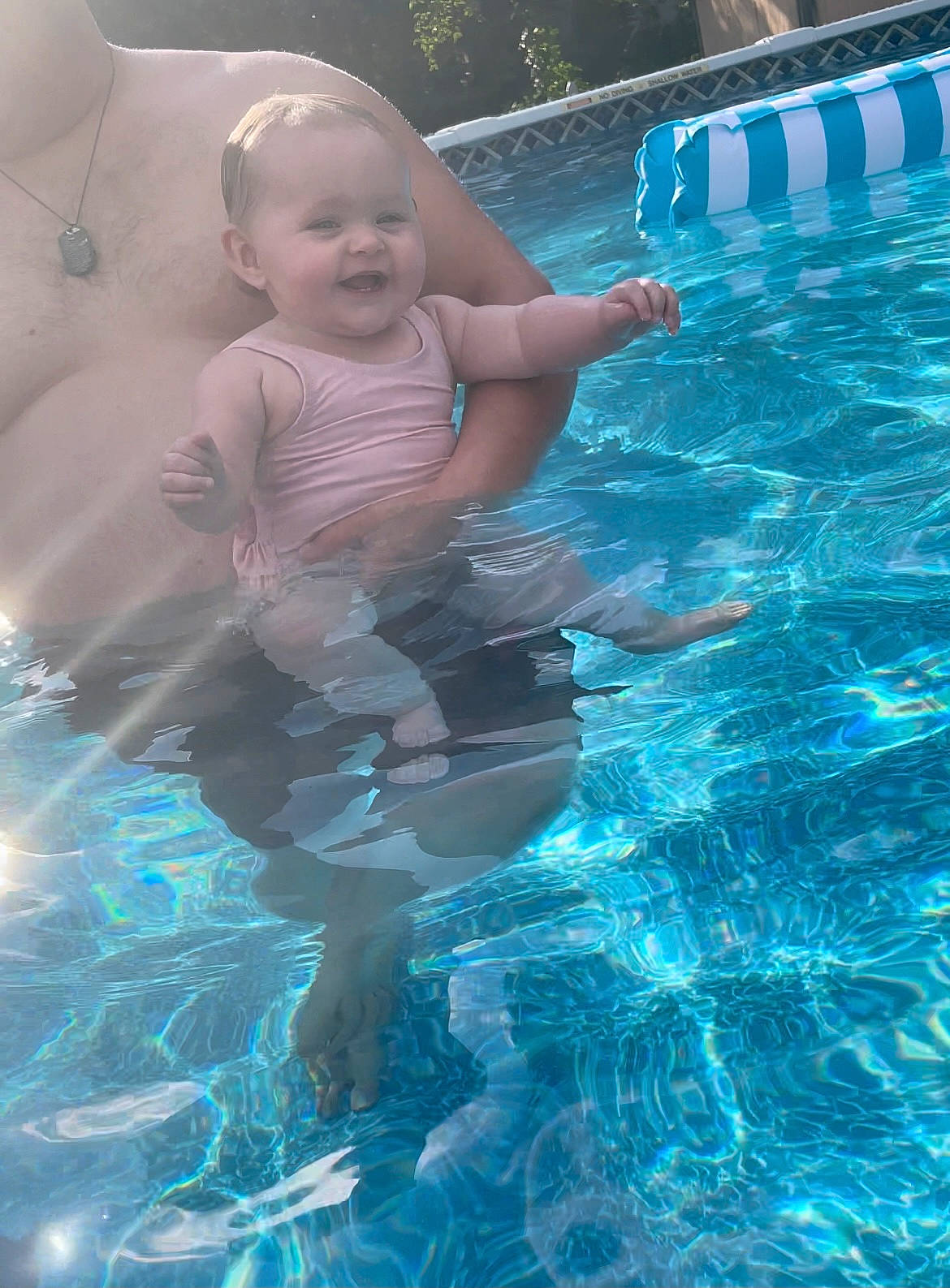 Kinsley Morgan joined the competition — help win amazing prizes! aqua, azure, baby, bathing, blue, child, fluid, fun, hand, happy, human_body, leisure, liquid, people_in_nature, person, photograph, recreation, smile, swimming_pool, toddler