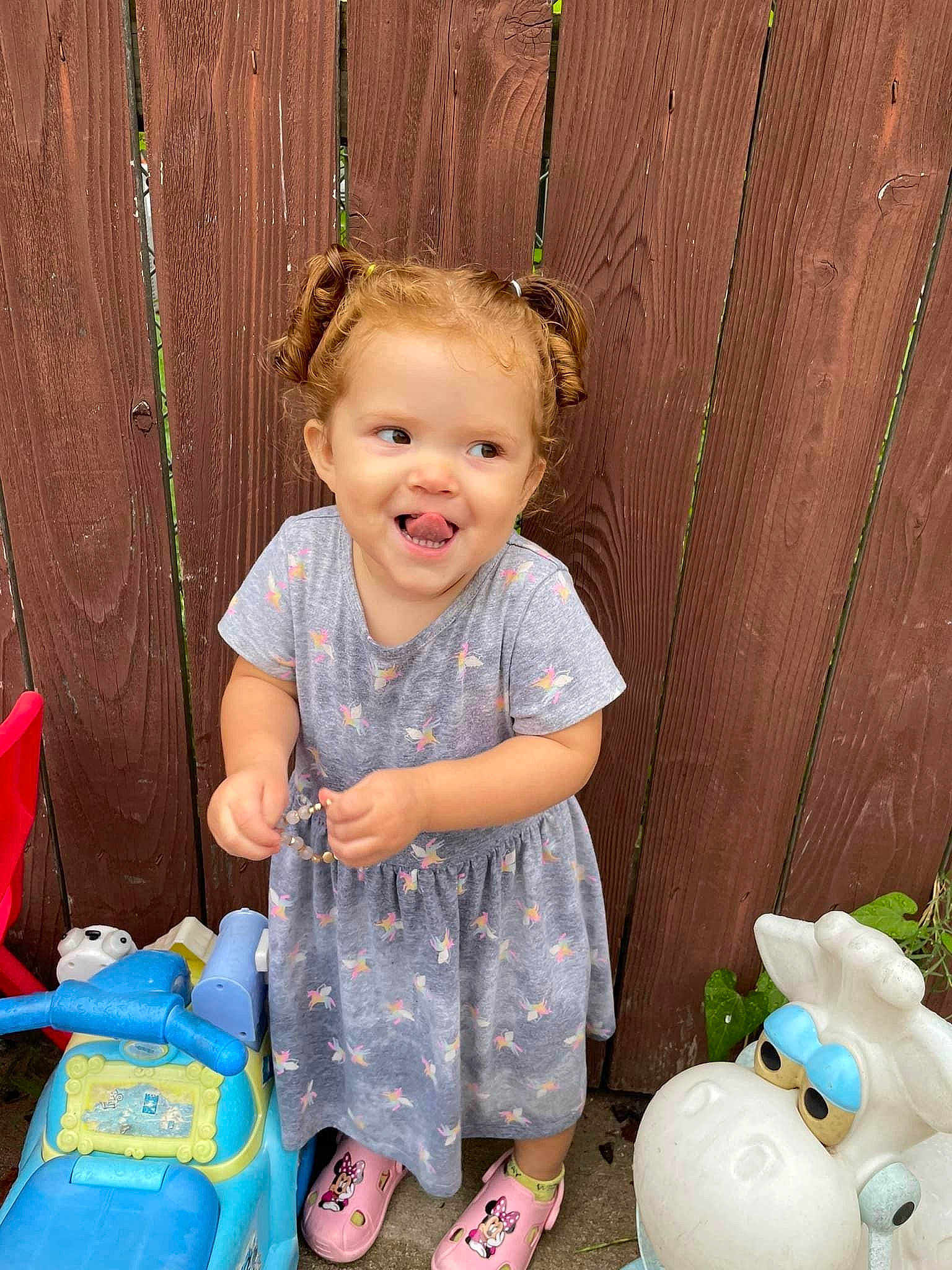 Rosalina is registered to the contest to win money with this photo: baby_toddler_clothing, blue, child, event, eye, fun, happy, head, joy, pattern, people, person, pink, product, sitting, smile, snapshot, textile, toddler, toy