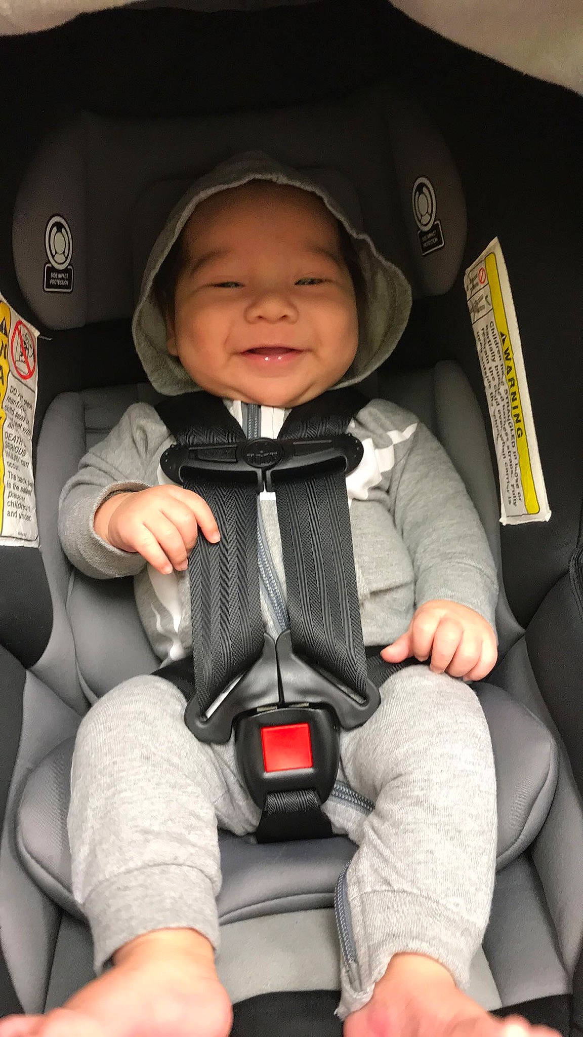 Gregory is registered to the contest to win money with this photo: auto_part, baby, baby_carriage, baby_in_car_seat, baby_products, car_seat, car_seat_cover, child, family_car, head_restraint, joy, person, product, seat_belt, toddler