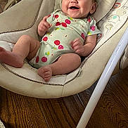 Emma joined the competition — help win amazing prizes! animal_print, baby, baby_bouncer, cheerful, cherries, child, closeup, cushion, family_photo, happy, home, indoor, infant, onesie, playtime, plush_toy, portrait, seated, smiling, wooden_floor