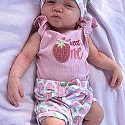 Emma joined the competition — help win amazing prizes! adorable, baby, blanket, bow, casual, child, cute, fashion, headband, indoors, infant, laying_down, newborn, pink_clothing, portrait, sleepy, small_hands, soft_light, soft_texture, strawberry_pattern