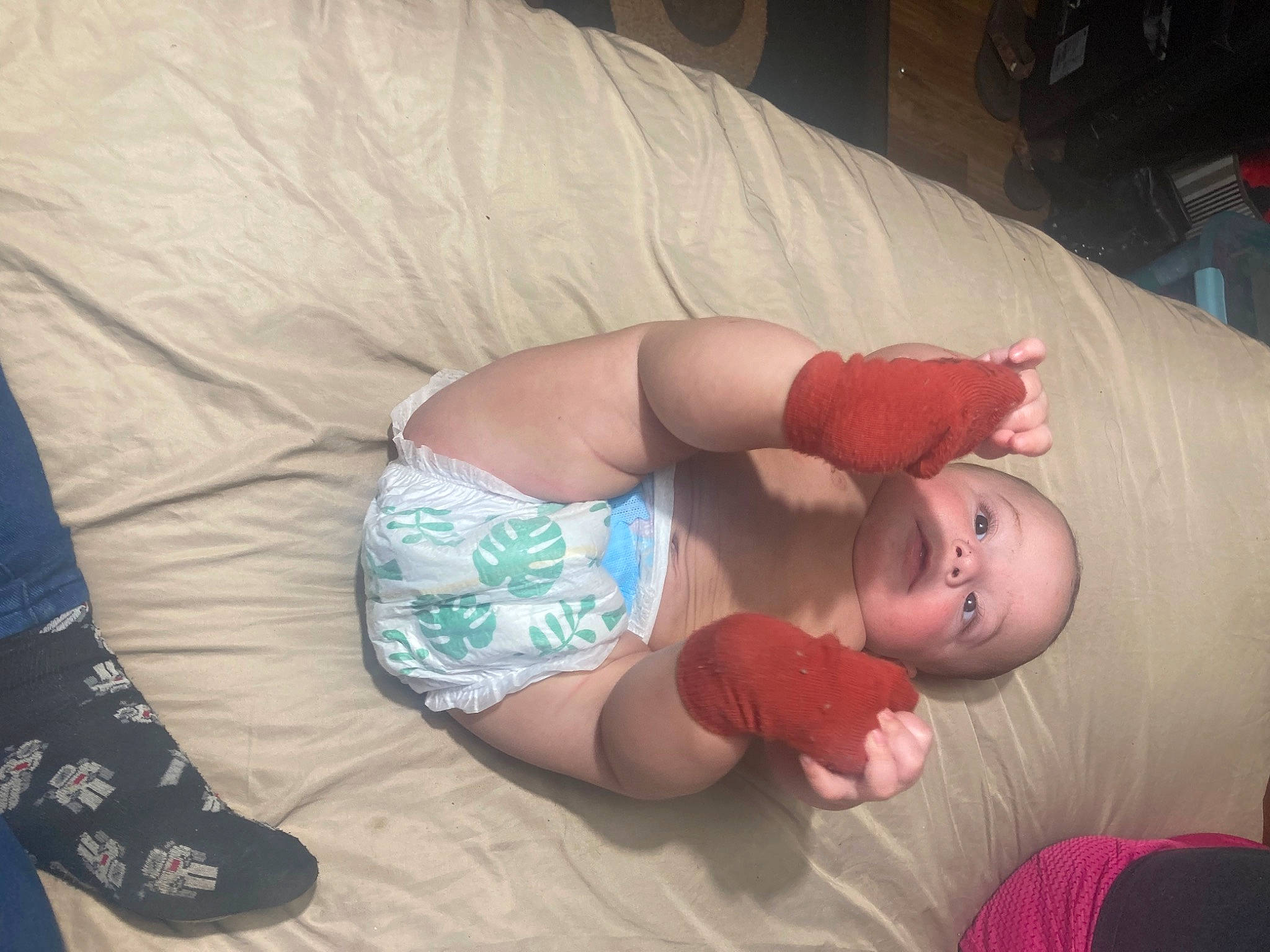Izayah is registered to the contest to win money with this photo: abdomen, baby, bed, chest, comfort, elbow, finger, fun, head, human_body, joint, knee, leg, mouth, muscle, person, skin, textile, thigh, toddler