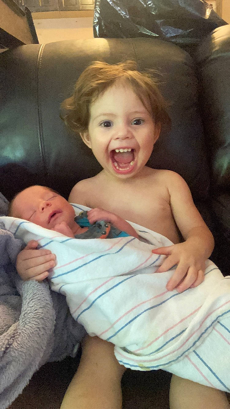 Izayah is registered to the contest to win money with this photo: baby, cheek, comfort, eye, facial_expression, finger, flash_photography, fun, gesture, hairstyle, hand, happy, head, human_body, iris, mouth, person, skin, smile, thumb