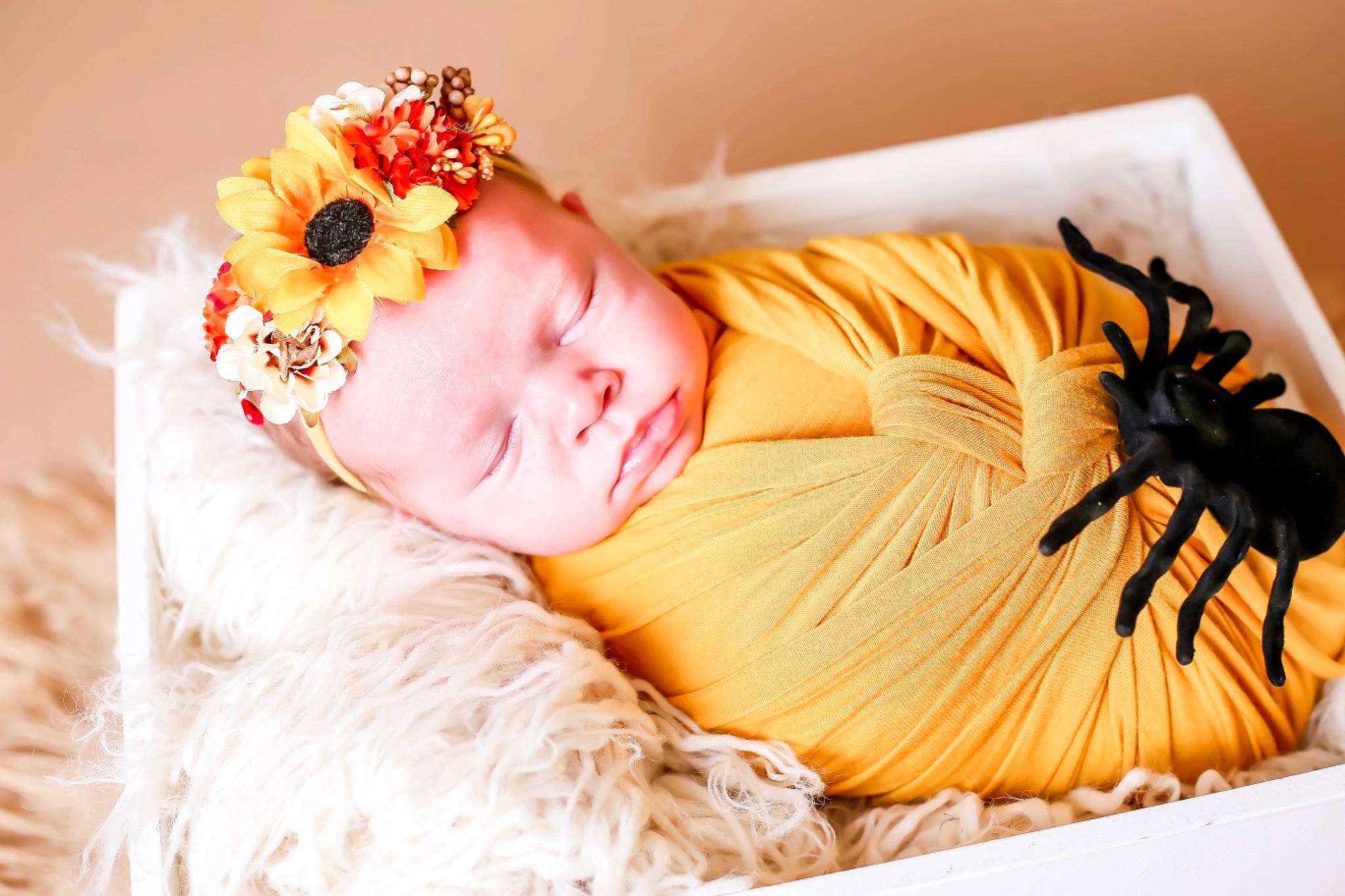 Kimberly is registered to the contest to win money with this photo: arm, arthropod, baby, baby_toddler_clothing, comfort, dress, eyelash, flower, hair_accessory, happy, hat, headband, headpiece, headwear, insect, jewellery, orange, peach, person, petal