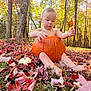 baby, pumpkin, autumn, leaves, forest, sunlight, outdoor, nature, child, fall, grass, trees, seasonal, cute, sitting, barefoot, orange, yellow, playful, leaf