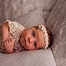 Emma is registered to the contest to win money with this photo: adorable, baby, baby_girl, blue_eyes, child, closeup, cute, face, hand, headband, indoors, infant, lace, lying_down, newborn, peaceful, person, portrait, skin, soft_blanket