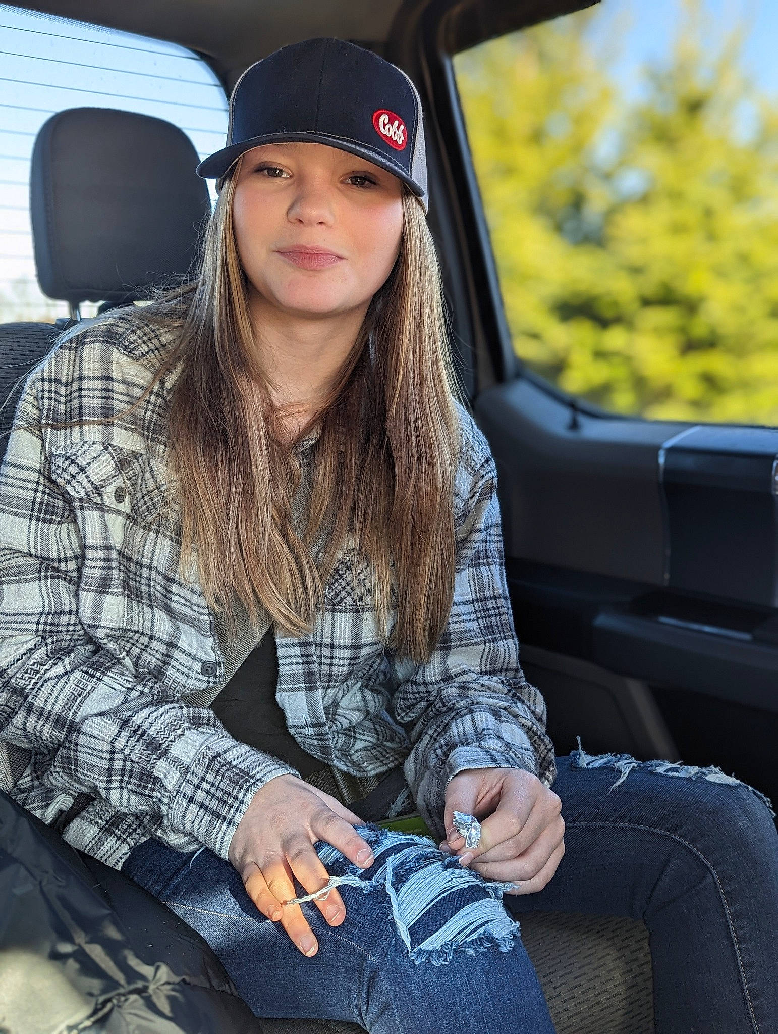 Brenna joined the competition — help win amazing prizes! auto_part, automotive_design, automotive_exterior, automotive_lighting, baseball_cap, black_hair, cap, car, cool, denim, electric_blue, eyewear, hand, headwear, jeans, long_hair, motor_vehicle, person, personal_luxury_car, plaid