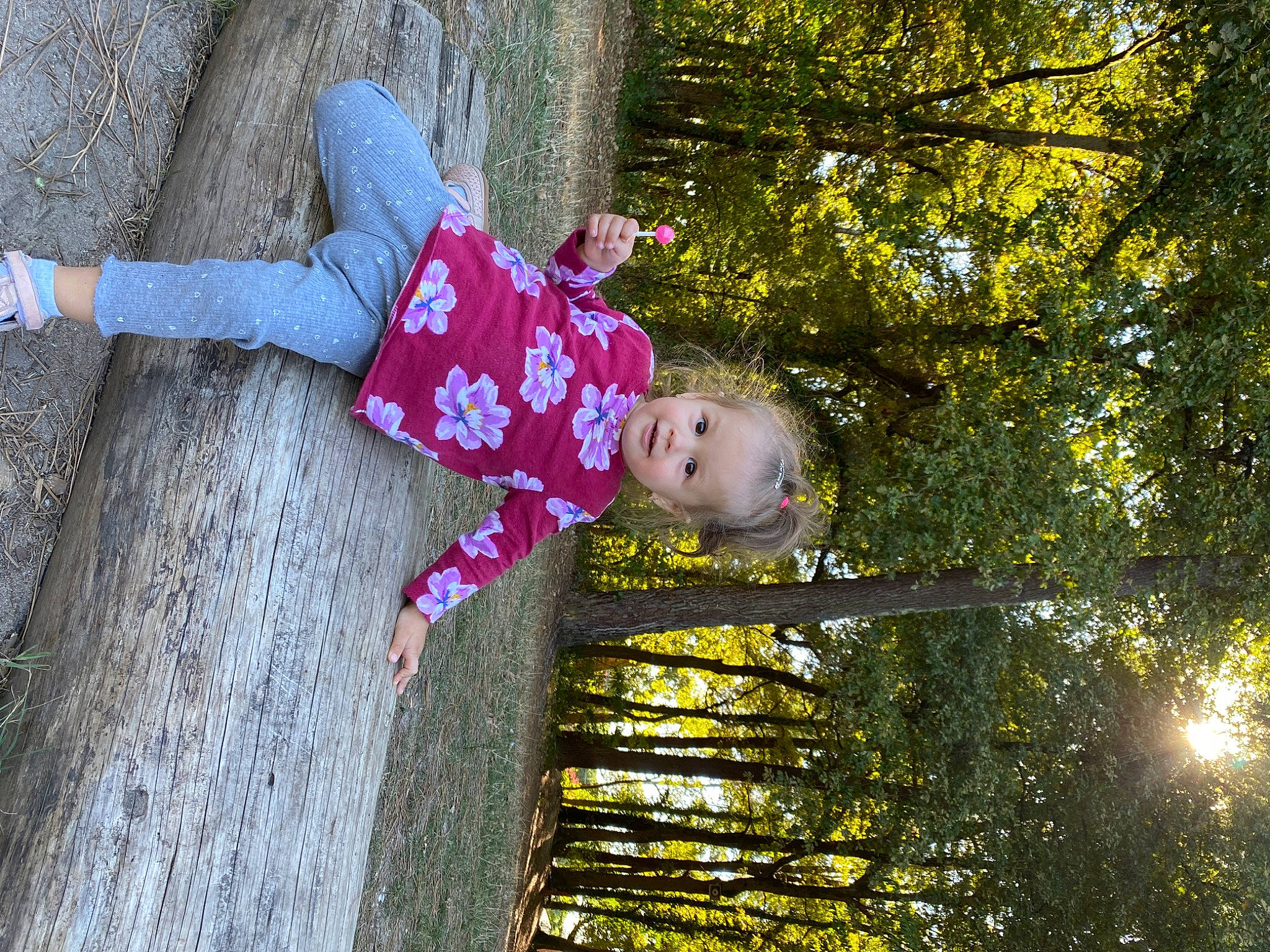 Danaila participe au concours pour gagner de l'argent avec cette photo : baby, baby_toddler_clothing, child, fun, grass, happy, joy, leisure, magenta, people_in_nature, person, plant, smile, toddler, tree, trunk, twig, wood, yellow