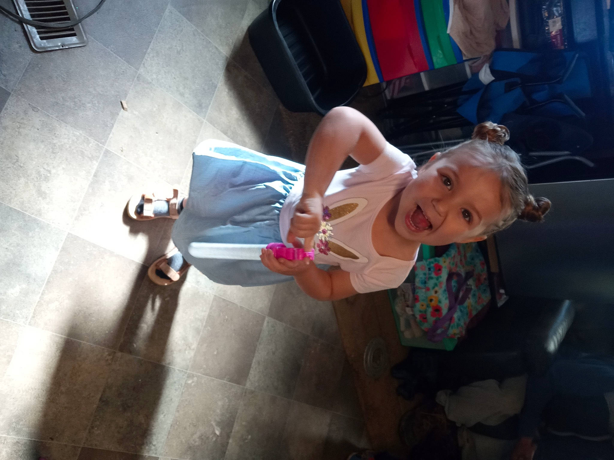 Sophia joined the competition — help win amazing prizes! automotive_exterior, automotive_lighting, bumper, child, flash_photography, flooring, fun, happy, human_leg, leg, leisure, motor_vehicle, person, sandal, shoe, sitting, smile, sneakers, thigh, toddler