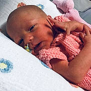 Eilidh joined the competition — help win amazing prizes! newborn, baby, infant, pink_knitwear, blanket, hospital, face, sleeping, resting, child, person, bed, soft, delicate, skin, hand, tubing, medical, closeup, portrait