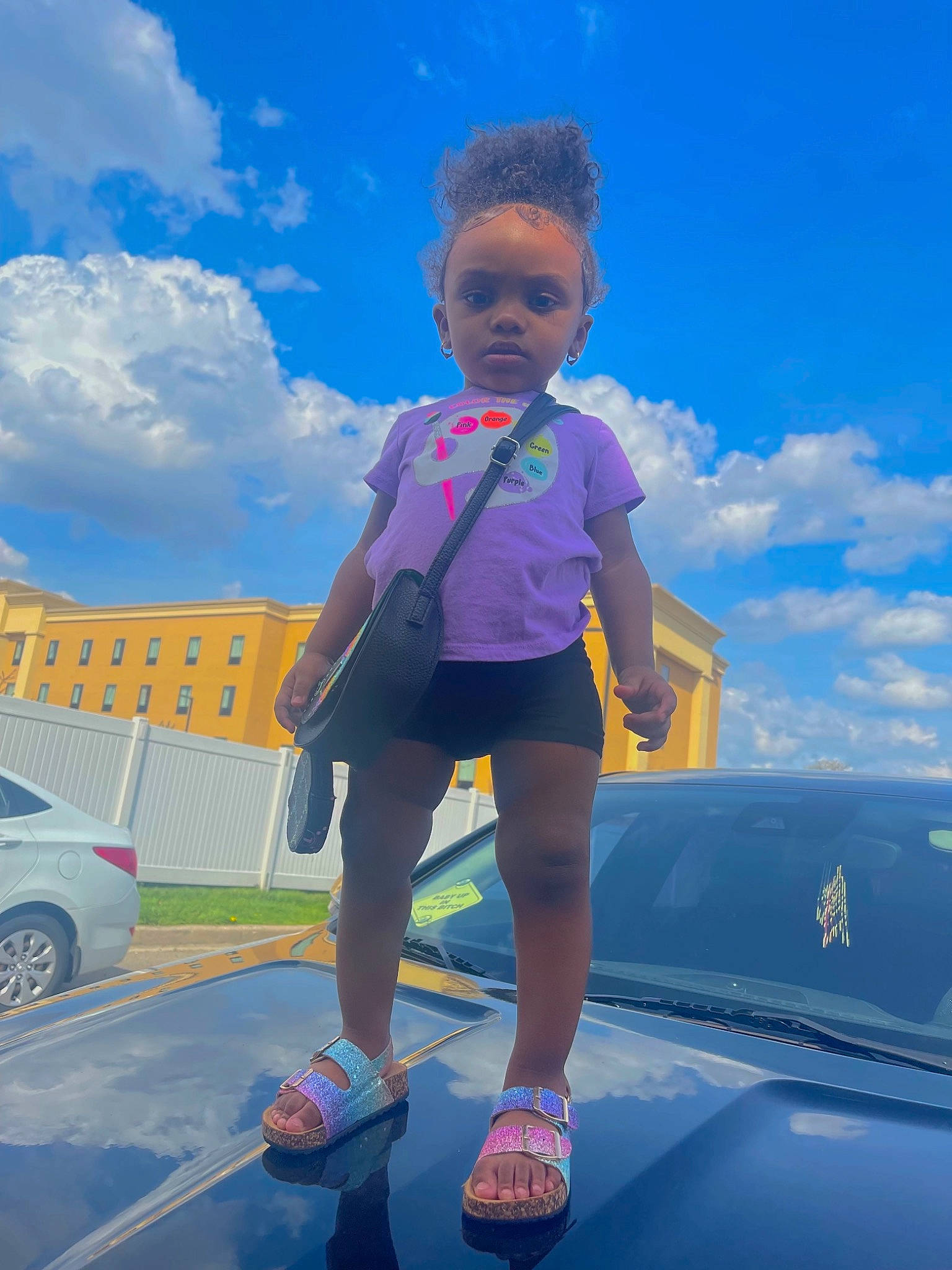 Katelyn joined the competition — help win amazing prizes! automotive_design, automotive_exterior, blue, car, cloud, electric_blue, family_car, fun, happy, hood, leisure, motor_vehicle, person, recreation, sky, tire, toddler, travel, vehicle, vehicle_door