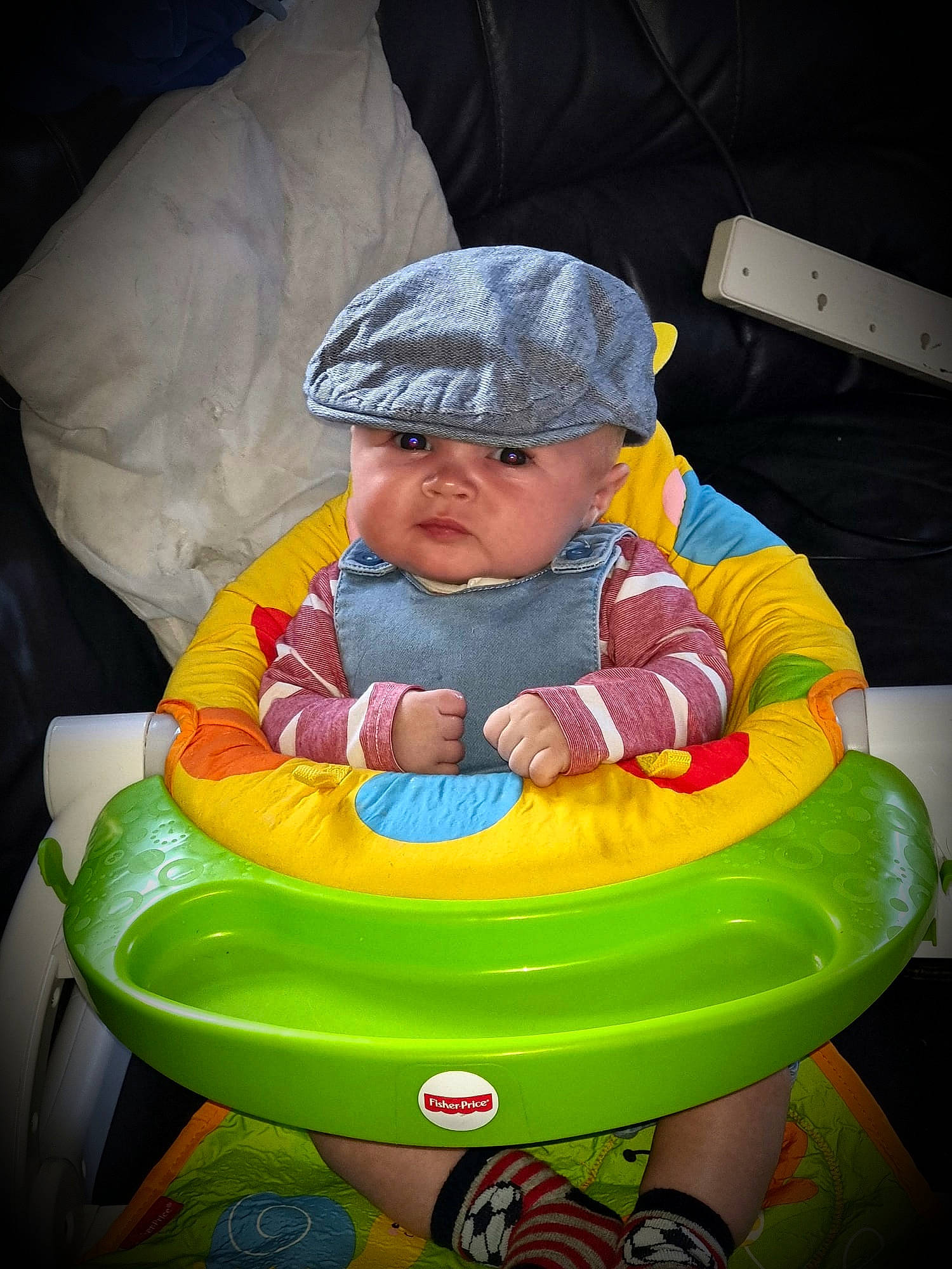 Harvey is registered to the contest to win money with this photo: baby, baby_carriage, baby_products, baby_toddler_clothing, baby_toys, cap, child, comfort, fun, happy, headwear, lap, leisure, person, plastic, play, product, recreation, sitting, tire