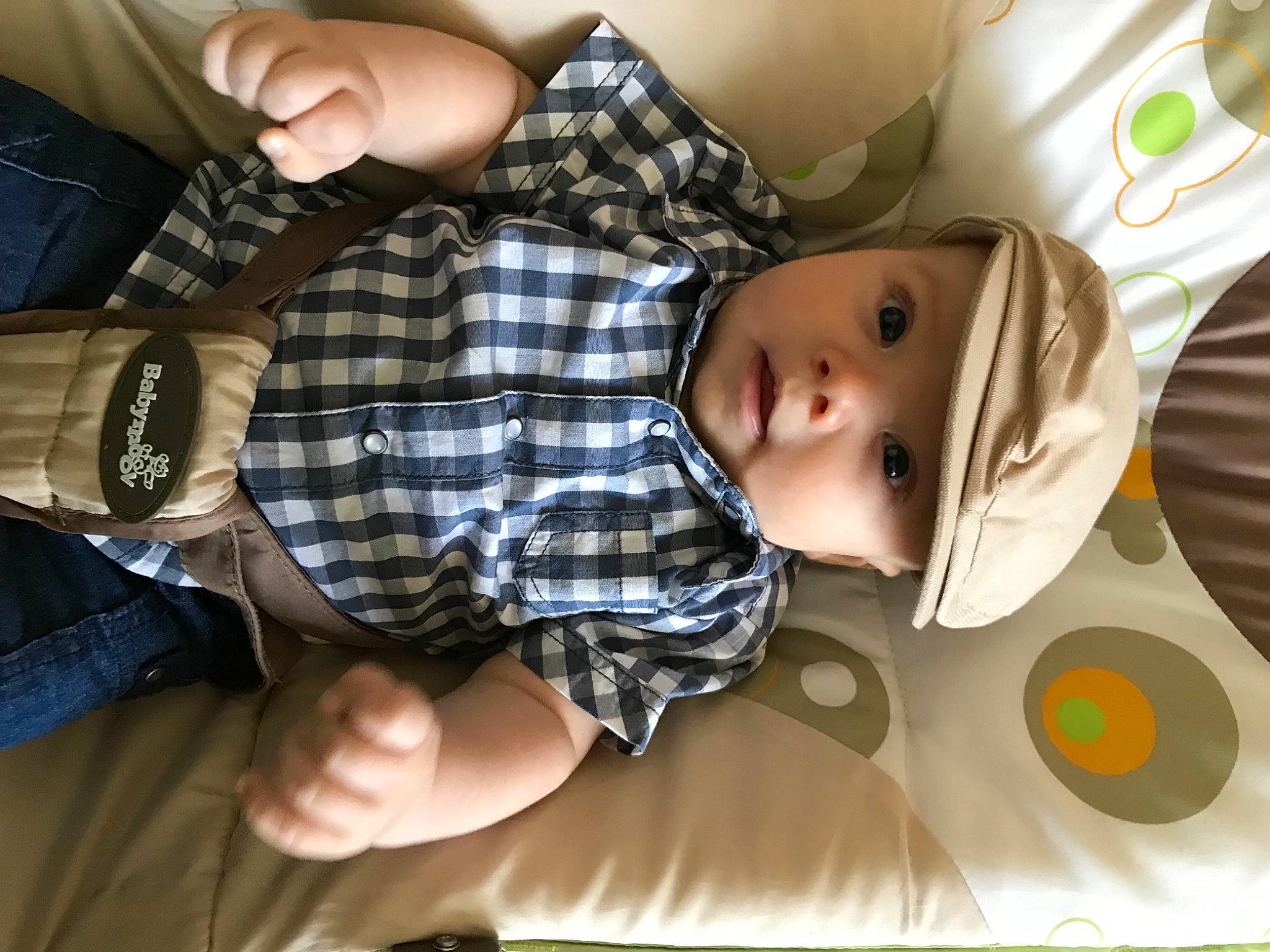 Leor participe au concours pour gagner de l'argent avec cette photo : baby, baby_toddler_clothing, cheek, child, comfort, dress_shirt, finger, gesture, grass, head, headwear, linens, pattern, person, plaid, sleep, sleeve, tartan, thumb, toddler